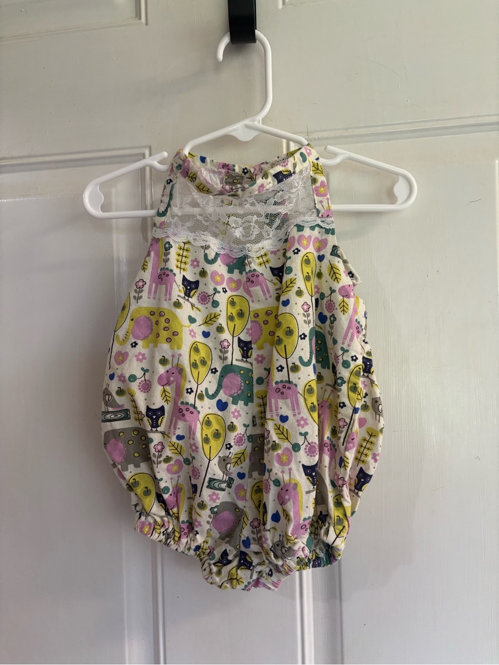 12M Custom made pink/green/cream safari animals lace inset open back romper. EUC